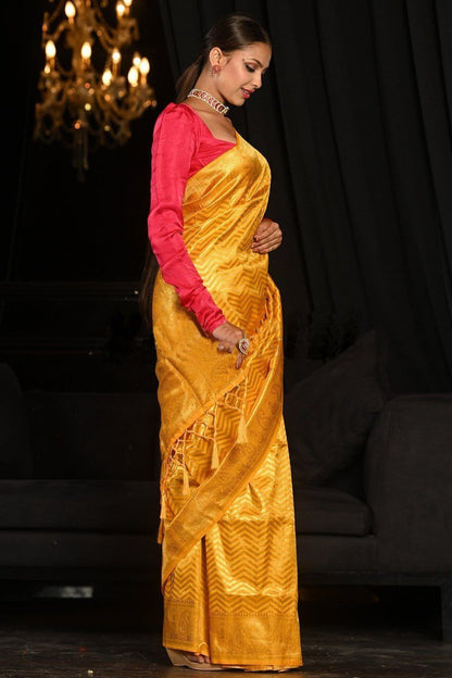 Yellow banarasi weaving silk saree with beautiful tassel
