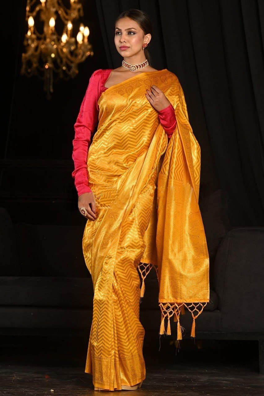 Yellow banarasi weaving silk saree with beautiful tassel