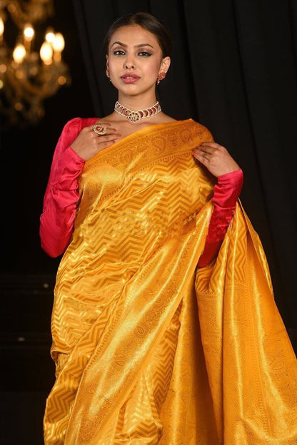 Yellow banarasi weaving silk saree with beautiful tassel